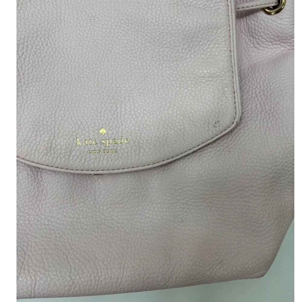 Kate Spade New York Pebbled Leather Drawstring Backpack Lavender Pink Gold Tone
